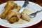 Boiled chicken leg in fish sauce slice and stab in fork