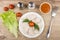 Boiled chicken meat, leaf lettuce, spices, sauce, tomatoes and f