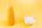 Boiled corn and salt on a yellow background/boiled appetizing corn and salt on a yellow background, top view