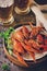 Boiled Crawfish and Fresh Beer in Beakers. Appetizer protein. Toned image