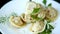 Boiled dumplings with meat and spices in a plate