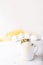 Boiled egg in a small cup on a white background. Eggs. Breakfast. Easter photo concept.