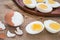 Boiled eggs and wooden plate