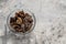 Boiled Kikurage mushrooms wood ears in a transparent bowl on a gray wooden table. Ingredient asian cuisine copy space