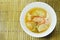 Boiled mixed vegetable topping shrimp Thai spicy soup on bowl