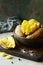 Boiled Potatoes in a peel in a bowl with spices, herbs, herbs. Lunch, the main side dish for dinner, with sour cream.