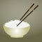 Boiled rice in bowl with chopsticks