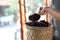 Boiled riceberry rice on wood basket with spoon in close up