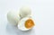 Boiled salty egg half cut on white background