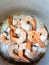 Boiled shrimp in a pot cooking preparation top view mobile photo