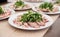 Boiled sliced meat with herbs and sauce on the kitchen counter