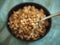 Boiled spelt in spoon, selective focus