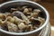 Boiled Tricholoma mushrooms in a metal bowl