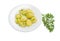 Boiled young potatoes with butter and dill, sprig of dill