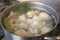 Boiling cauliflowers in a pot