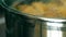 Boiling food under glass pan cover