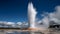Boiling hot water erupts from volcanic geyser generated by AI