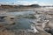 Boiling mud pots in Hverir Namafjall geothermal place in Iceland