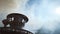 Boiling russian samovar on blue sky background, slow motion shot