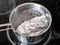 Boiling solution of baking soda with aluminum foil