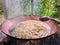 Boiling the sugarcane juice to make garapa