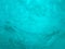 Boiling water drops. Attractive natural turquoise blue underwater colors. Beautiful texture of the movement of the waves