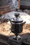 Boiling water for tea in a samovar at the morning, at the beginning of spring