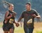 BOISE, IDAHO/USA - AUGUST 10: Couple 10656 and 10657 hold hands while running at the The Dirty Dash in Boise, Idaho on August 10,