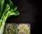 Bok choy or Chinese-cabbage and micro greens on black table.