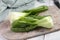 Bok choy, or pak choi on a cutting board