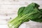 Bok choy on wooden floor, Bok choy or Chinese-cabbage on wooden board and wooden floor.Bok choy is the best leafy green vegetable