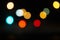 Boke. Photo without focus. Lights on a black background. Defocused Image Of Illuminated Lights At Night