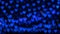 Bokeh background with blue hearts on black background. Love concept. Theme for Valentine\\\'s Day