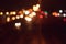 Bokeh background of unfocused colorful street lights at night