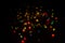 Bokeh on black background for use in photo editor. Banner with multicolored defocused lights garlands in form of stars. Beautiful