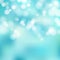 Bokeh blue and white Sparkling Lights Festive background with te