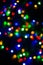 Bokeh of blurred Christmas lights - all colours - green, blue, orange, white, red