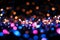 Bokeh brilliance Unfocused colorful lights create an abstract spectacle on black