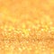 Bokeh. Christmas gold blinking background