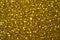 Bokeh circle with gold sparkles background. Yellow glitter backdrop. Golden