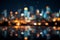 Bokeh city lights in an abstract, blurred night skyline view