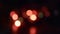 Bokeh flashlights. Blinking Christmas garland with blurry light. Christmas colored blurred winter background. Happy New Year