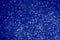Bokeh in the form of blue hearts. Color of the year 2020 classic blue. Main color trend