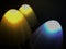 Bokeh lights abstract background in dark night colors. Photo. Large multi-colored round glare from headlights or lamps of red,