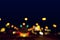 Bokeh lights on road in the city, defocused night street lights