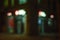 Bokeh signboards and shop windows. Blurred image of neon light in a shop window at night in the city