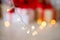 Bokeh, silhouette of a Christmas garland, background, Christmas tree