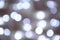 Bokeh silver blurred background. Abstract light bokeh background