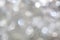 Bokeh silver white light universal shiny sparkle background