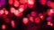 Bokeh valentine background with red magenta glitter particles, sparkles. Valentines day. Beautiful magic light. Luxury romantic